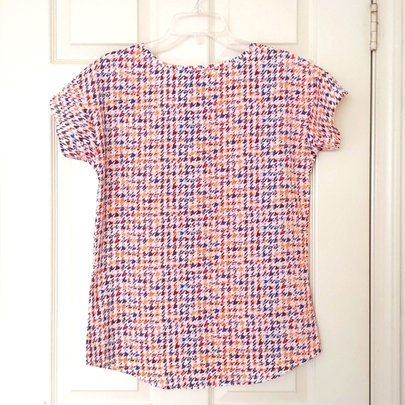 NWT. The Limited Short Sleeve Loose Fit Blouse with multi color patterns. - Picture 2 of 4